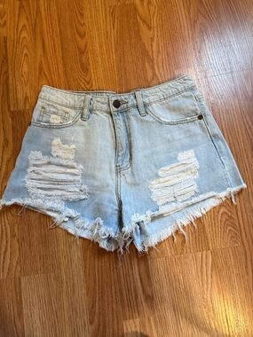 Women's Light Blue Distressed Denim Shorts with Frayed Hem
